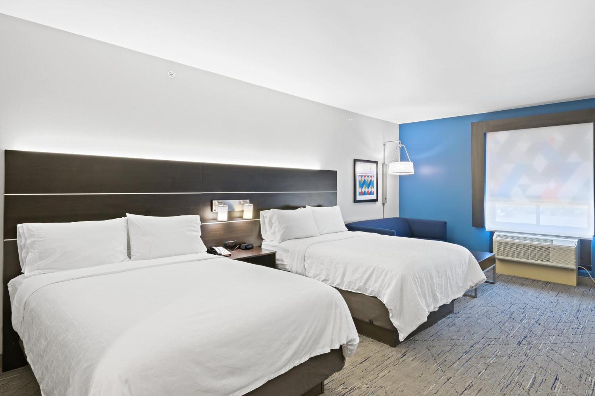 Queen Suite with Two Queen Beds and Sofa Bed